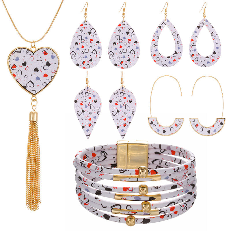 Conjunto de brazalete de arete de cuero de la serie de amor rosa al por mayor